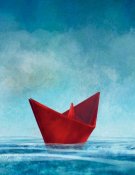 Le petit bateau en papier rouge