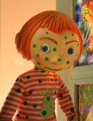 Miriam et les boutons verts